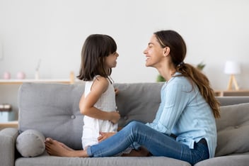 Child and parent talking