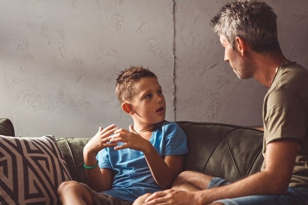 Child and a parent talking