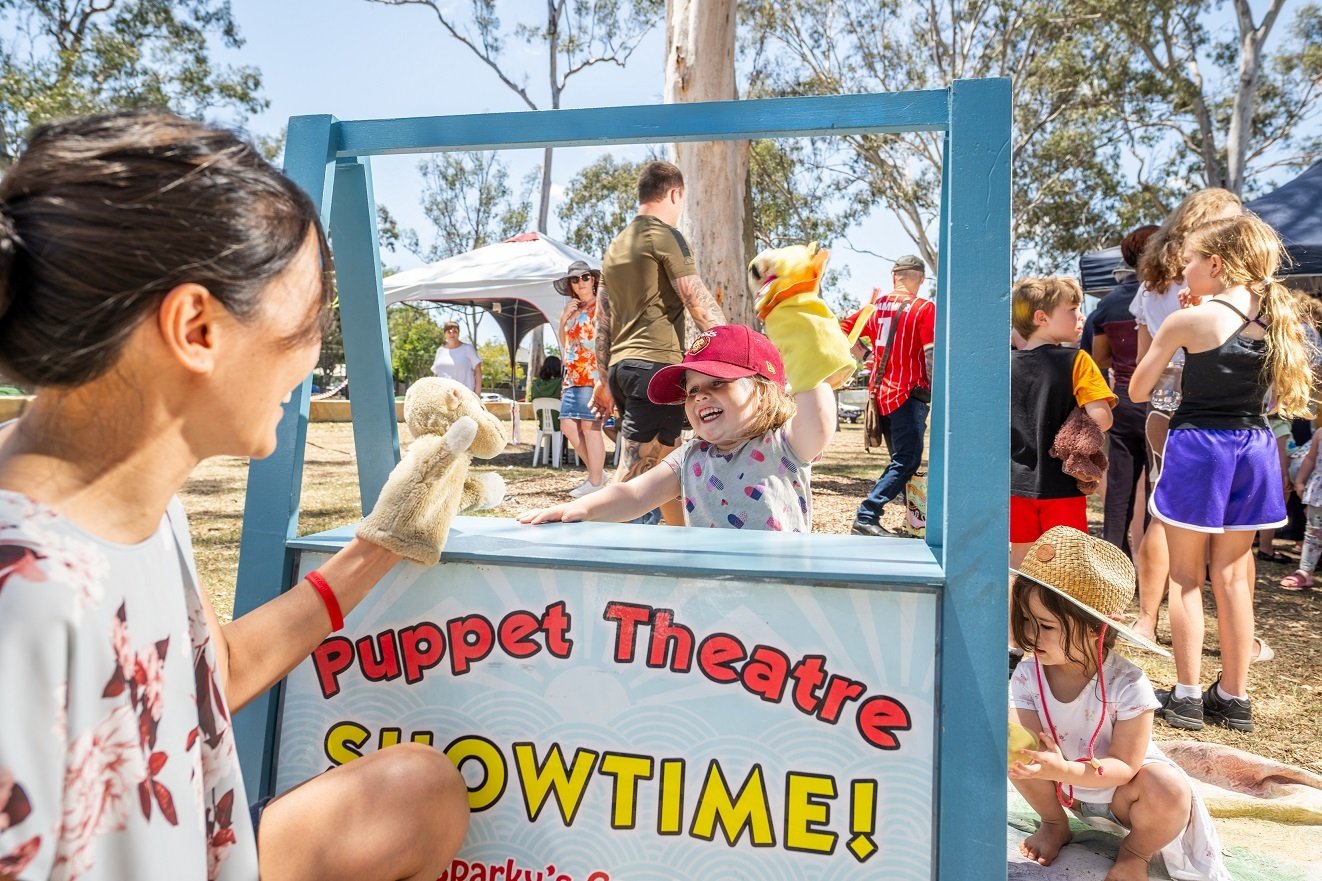Little girl with puppets
